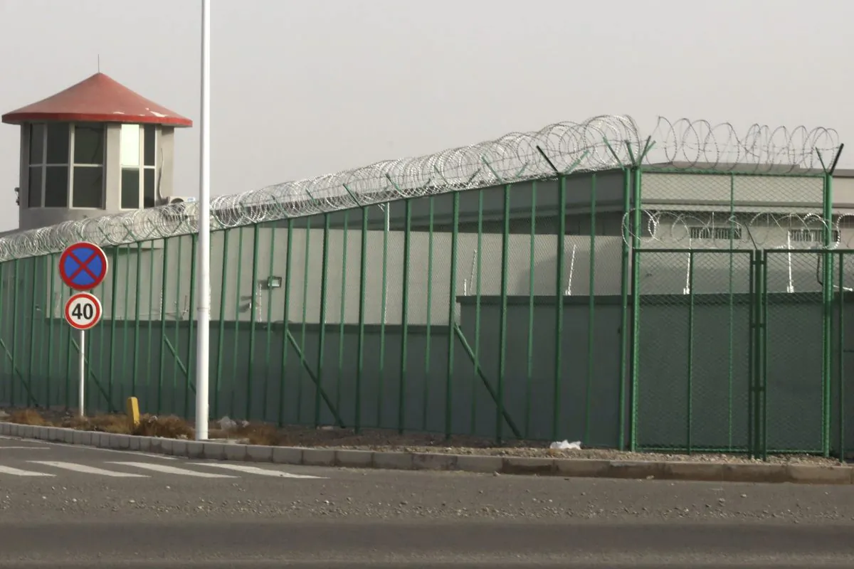 A guard tower and barbed wire fences surround an internment facility in the Kunshan Industrial Park in Artux in western China's Xinjiang region on Dec. 3, 2018. A U.S. envoy on religion has described China’s internment of an estimated 1 million Muslims as a “horrific situation.” Ambassador-at-large Sam Brownback called for an independent investigation into the detentions and the release of those being held. (Ng Han Guan/AP)
