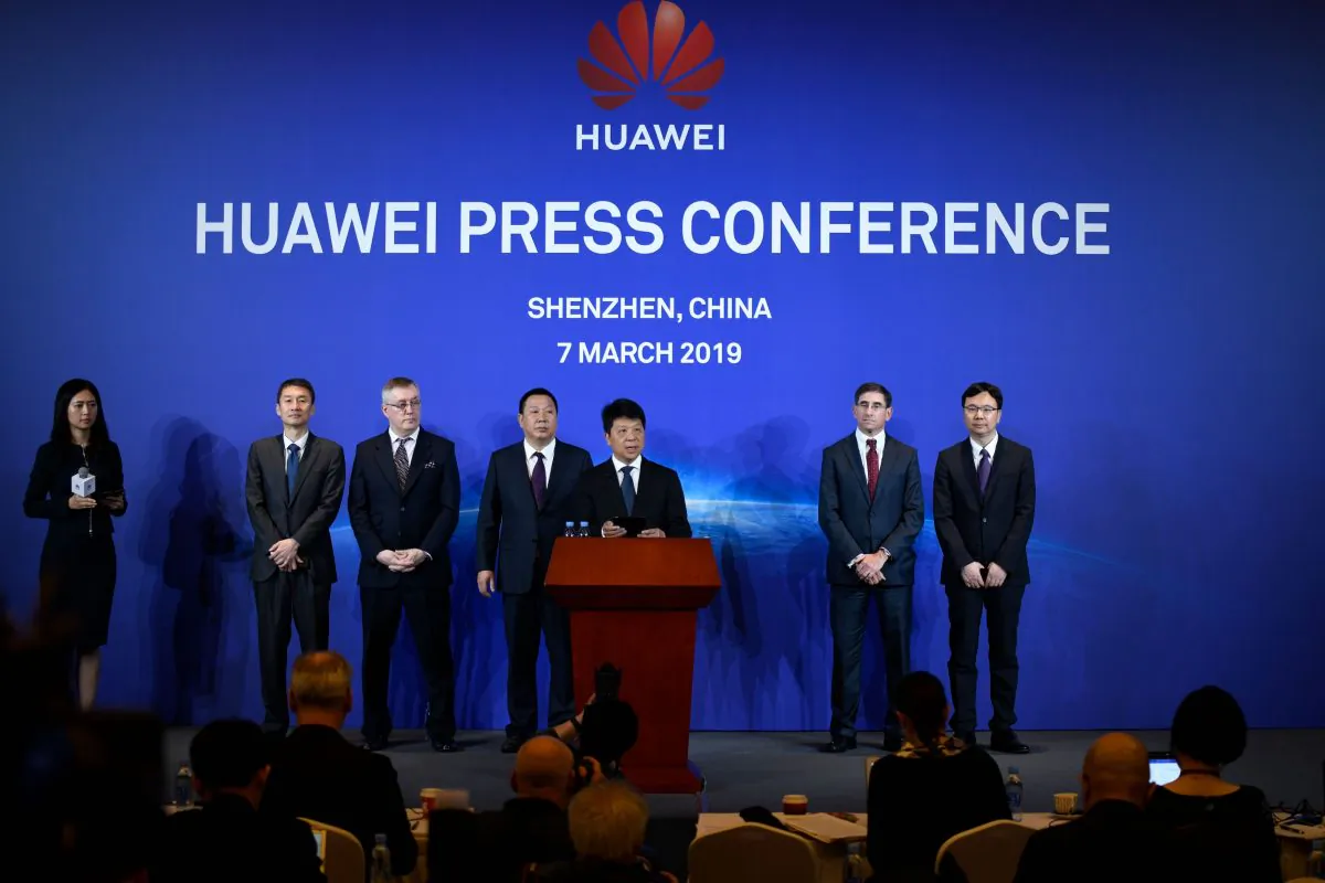 Huawei's rotating Chairman Guo Ping (C) speaks during a press conference in Shenzhen, China's Guangdong Province on March 7, 2019. Huawei said on March 7 it was suing the United States for barring government agencies from buying the telecom company's equipment and services. (Wang Zhao/AFP/Getty Images)