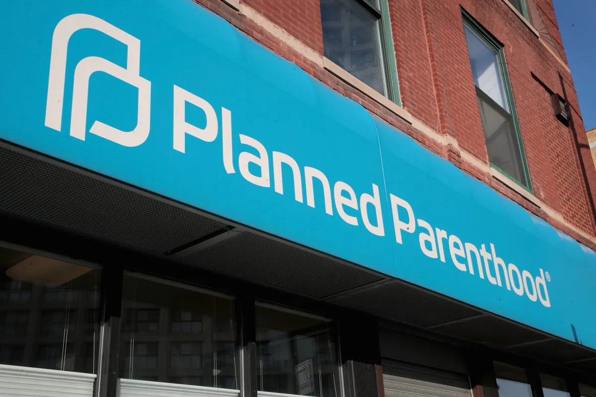 A sign hangs above a Planned Parenthood clinic in Chicago, Ill., on May 18, 2018. (Scott Olson/Getty Images)