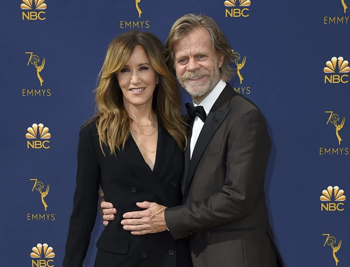 Felicity Huffman and William H. Macy arrive at the 70th Primetime Emmy Awards in Los Angeles, on Sept. 17, 2018. (Jordan Strauss/Invision/AP)