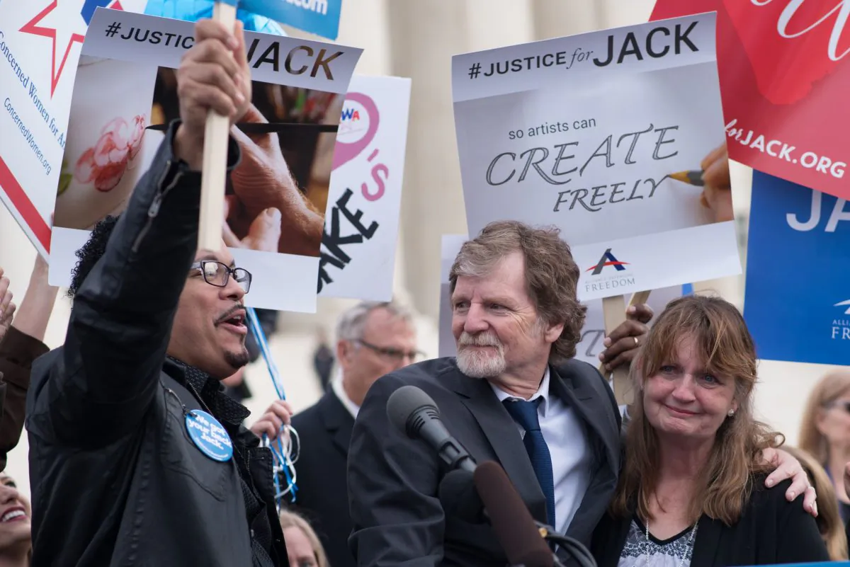 Jack Phillips (C), owner of Masterpiece Cake in Colorado, stands with supporters outside the U.S. Supreme Court after Masterpiece Cakeshop vs. Colorado Civil Rights Commission were heard, in Washington, D.C., on Dec. 5, 2017. (Mari Matsuri/AFP/Getty Images)