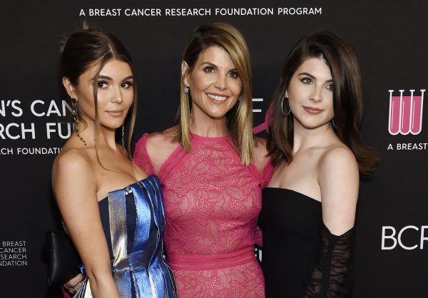 Actress Lori Loughlin, center, poses with daughters