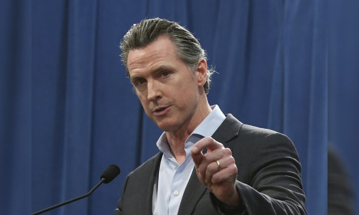 California Gov. Gavin Newsom answers questions at a Capitol news conference in Sacramento, Calif. in a file photograph. (Rich Pedroncelli/AP)