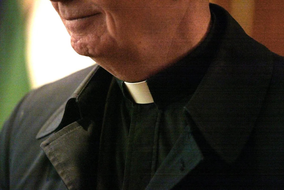 The collar of a priest is seen at St. Adalbert Catholic Church March 29, 2002, in Chicago. (Tim Boyle/Getty Images)