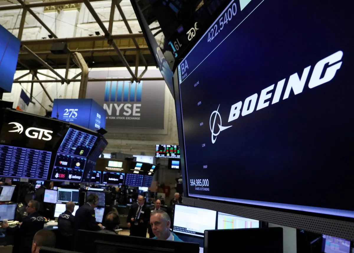 The company logo for Boeing is displayed on a screen on the floor of the New York Stock Exchange (NYSE) in New York City, on March 11, 2019. (Brendan McDermid/Reuters)