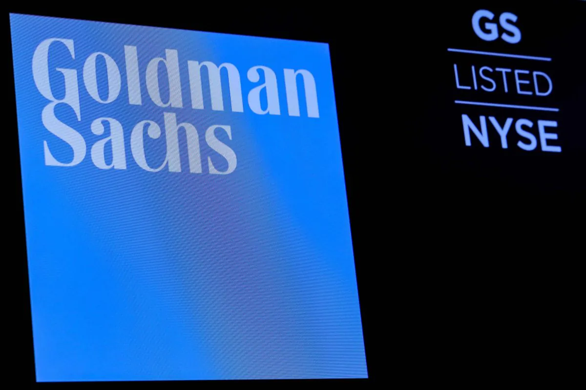 FILE PHOTO: The ticker symbol and logo for Goldman Sachs is displayed on a screen on the floor at the New York Stock Exchange (NYSE) in New York, U.S., December 18, 2018. REUTERS/Brendan McDermid
