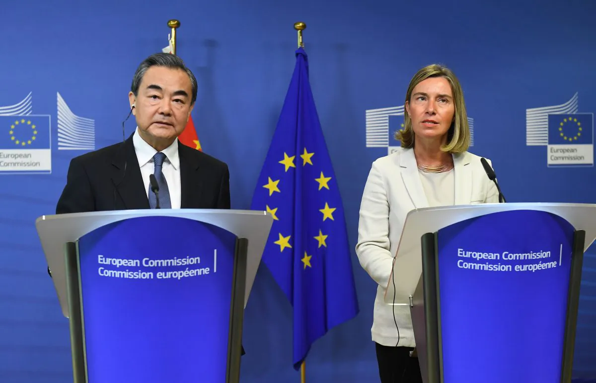 China's Foreign Minister Wang Yi (L) and EU foreign policy chief Federica Mogherini address a joint press conference at the European Commission in Brussels on June 1, 2018. (Emmanuel Dunand/AFP/Getty Images)