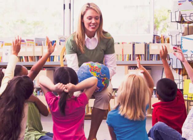 Teacher talking to students. (Monkey Business Images/Shutterstock)