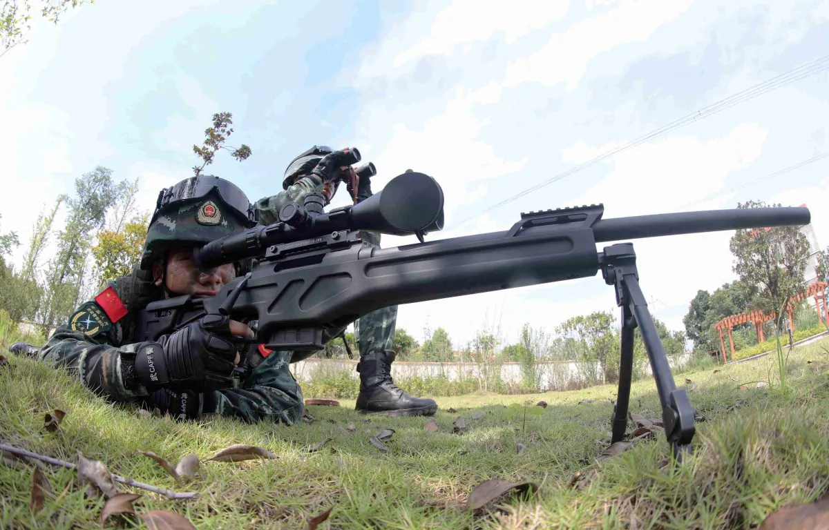This photo taken on July 1, 2018 shows Chinese paramilitary personnel training in Chenzhou in China's central Hunan province. (-/AFP/Getty Images)