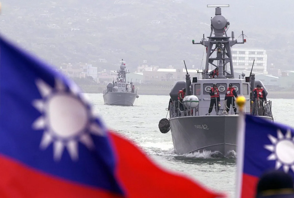 Navy soldiers patrol near the naval base of Tamshui, Taipei county, on Jan. 13, 2004. (Sam Yeh/AFP/Getty Images)