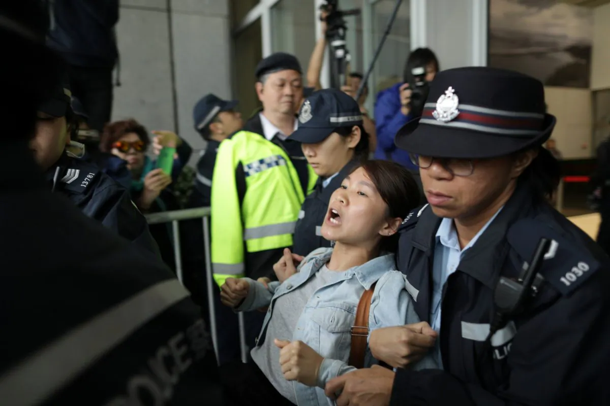 A protester is arrested by police after storming Hong Kong government headquarters over a proposal to extradite fugitives to mainland China, in Hong Kong, China
on March 15, 2019. (Stanley Leung/Reuters)