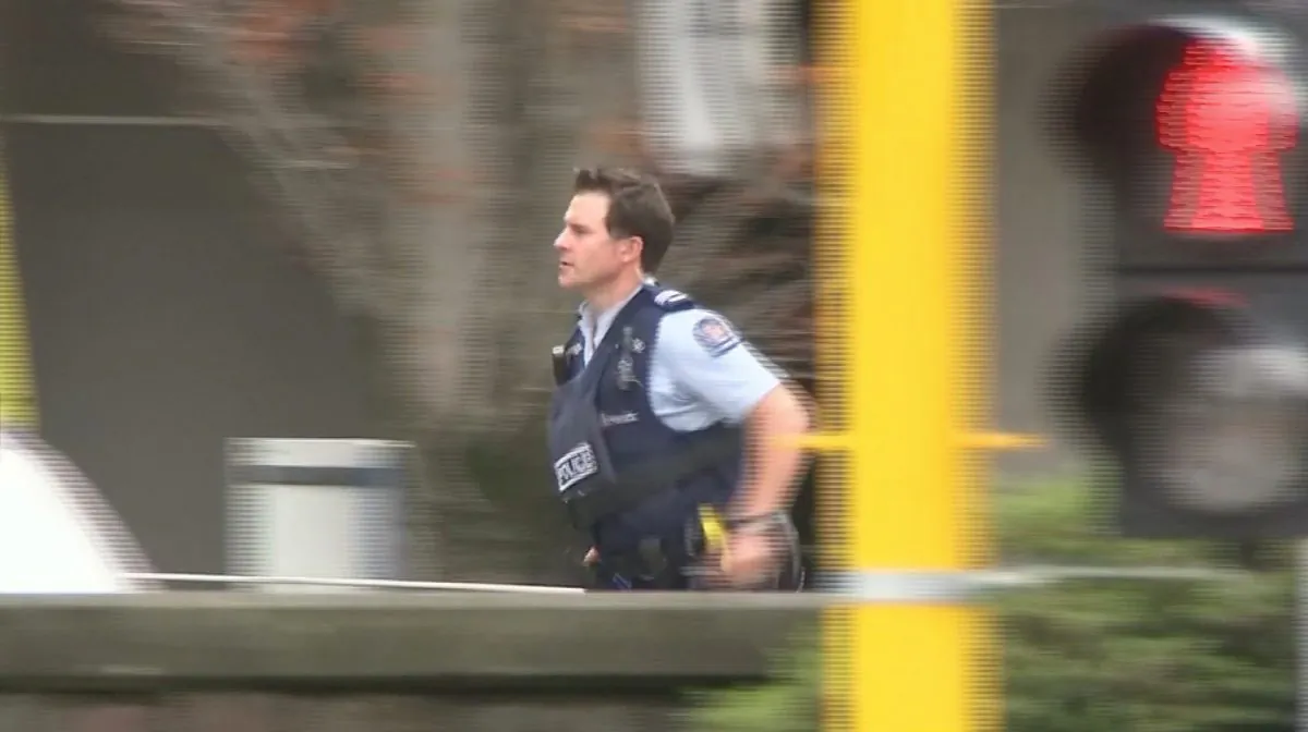 A police officer is seen after reports that several shots had been fired at a mosque in central Christchurch, New Zealand, on March 15, 2019. (TVNZ/via REUTERS TV)
