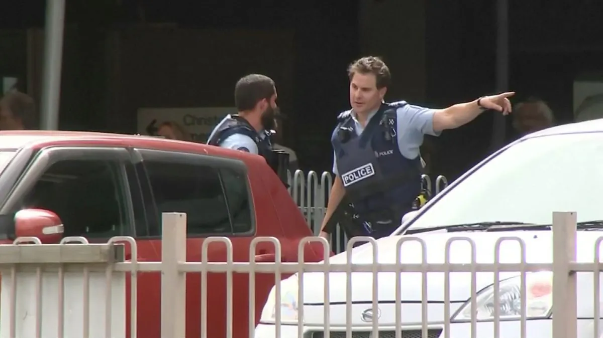 Police officers are seen after reports that several shots had been fired at a mosque, in central Christchurch, New Zealand March 15, 2019, in this still image taken from video.  TVNZ/via REUTERS TV