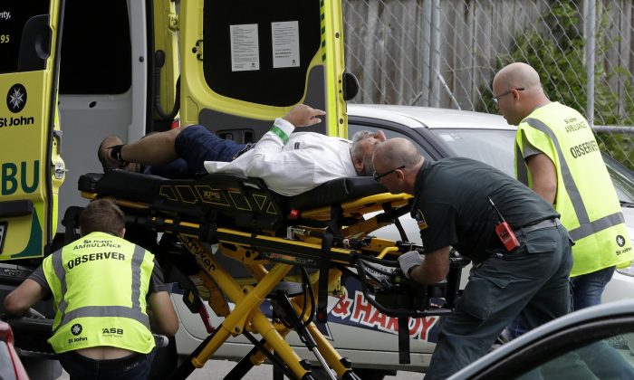 Ambulance staff take a man from outside a mosque in central Christchurch, New Zealand, on March 15, 2019. (Mark Baker/AP Photo)