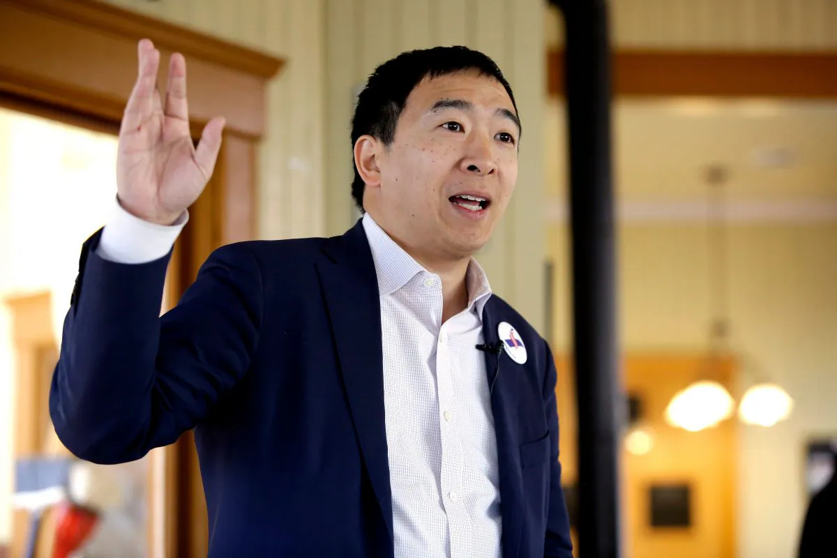Entrepreneur and 2020 presidential candidate Andrew Yang speaks during a campaign stop at the train depot in Jefferson, Iowa, on Feb. 1, 2019. (Joshua Lott/AFP/Getty Images)