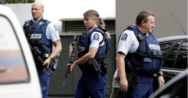 Armed police patrol outside a mosque in central Christchurch, New Zealand