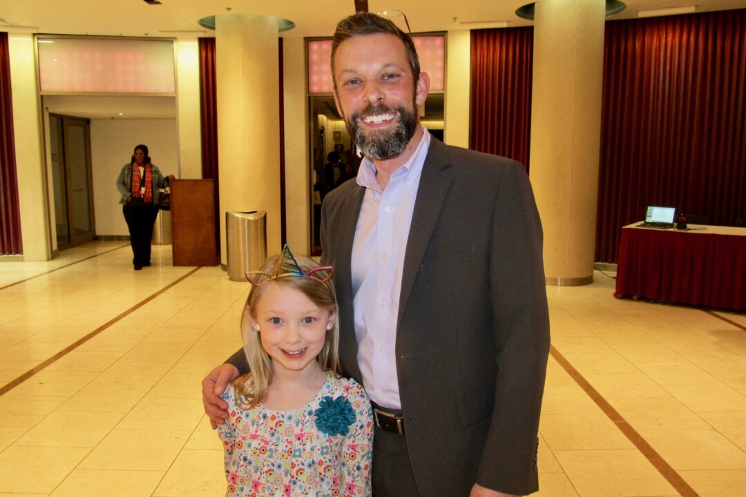 Lily and Robert Giere enjoyed Shen Yun at BJCC Concert Hall, on March 16, 2019. (Ronald Ree/The Epoch Times)