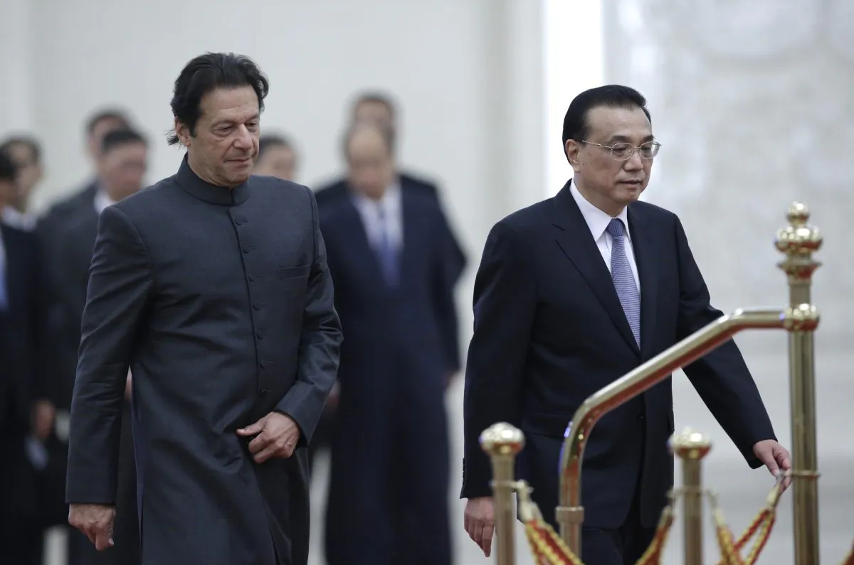 Pakistani Prime Minister Imran Khan and China's Premier Li Keqiang attend a welcome ceremony at the Great Hall of the People in Beijing on Nov. 3, 2018. (Jason Lee/AFP/Getty Images)