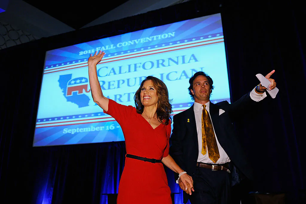 Republican presidential candidate Michele Bachmann (R-MN), escorted by California Republican Party chairman Tom Del Beccaro, arrives to deliver a speech to the California Republican Party Convention banquet Sept. 16, 2011. (Kevork Djansezian/Getty Images)