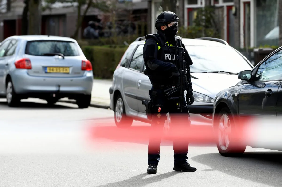 A policeman stands guard after a shooting in Utrecht, The Netherlands, on March 18, 2019. (Piroschka van de Wouw/Reuters)