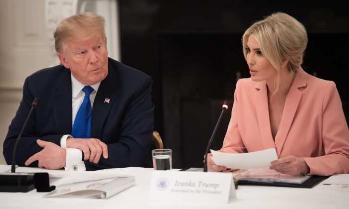 President Donald Trump alongside senior advisor and daughter Ivanka Trump during the first meeting of the American Workforce Policy Advisory Board in the State Dining Room of the White House on March 6, 2019. (Saul Loeb/AFP/Getty Images)