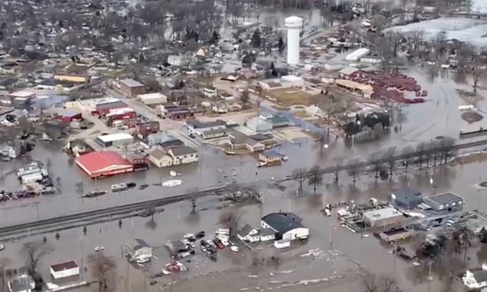 An aerial view of damaged buildings after a storm triggered historic flooding, in Valley, Nebraska, U.S. in this still image from a handout video taken March 16, 2019. Office of Governor Pete Ricketts/Handout via REUTERS