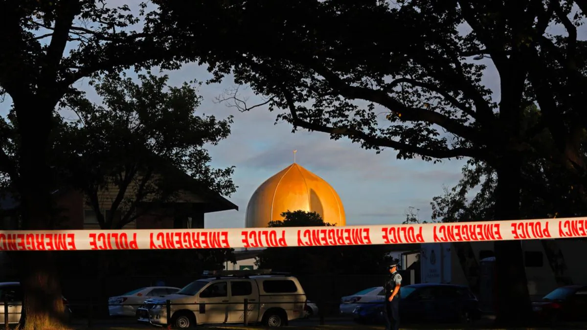 A police officer stands guard in front of the Masjid Al Noor mosque in Christchurch, New Zealand on March 17, 2019, where one of two mass shootings occurred. (Vincent Yu/AP Photo)