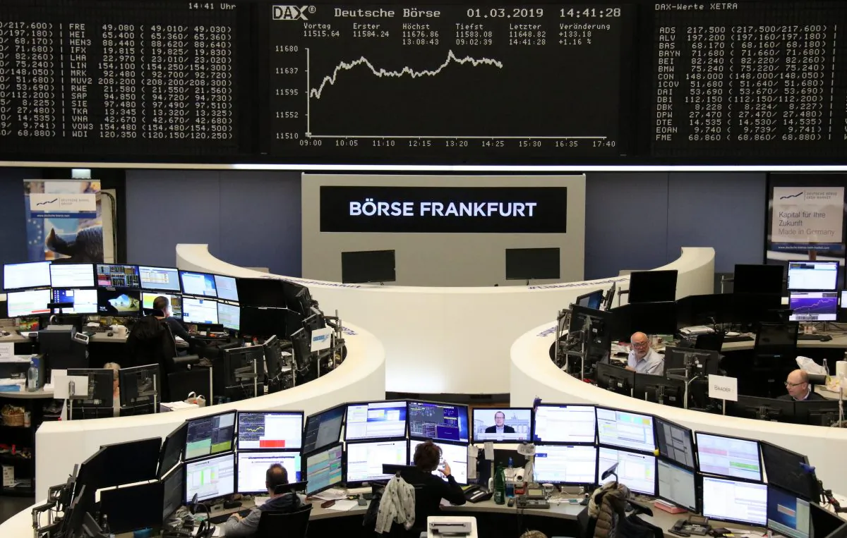 FILE PHOTO: The German share price index DAX graph is pictured at the stock exchange in Frankfurt, Germany, March 1, 2019.    REUTERS/Staff