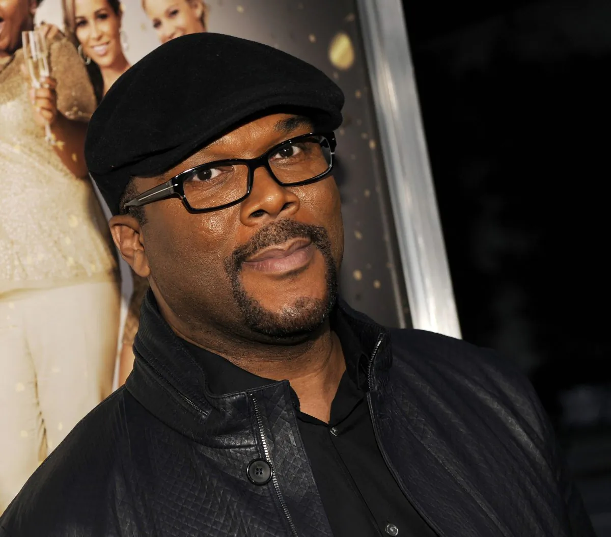 Tyler Perry arrives at the premiere of "The Single Moms Club" in Los Angeles, on March 10, 2014. Perry has reportedly offered to help pay for funeral expenses and rent for four children whose mother was killed in Alpharetta, Ga., on March 16, 2019. (Chris Pizzello/Invision/AP)