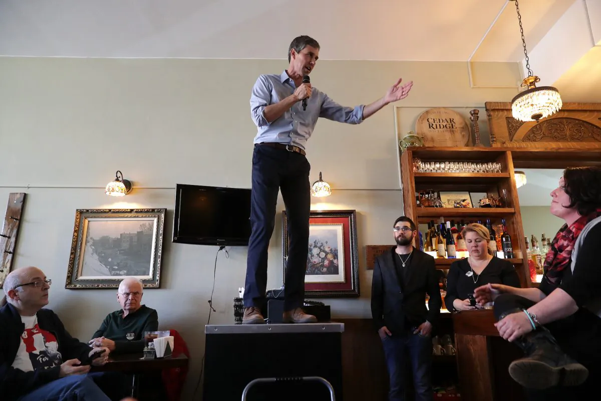 Democratic presidential candidate Beto O'Rourke answers questions from voters during his second day of campaigning for the 2020 nomination at The Sing-A-Long Bar and Grill in Mount Vernon, Iowa, on March 15, 2019.(Chip Somodevilla/Getty Images)