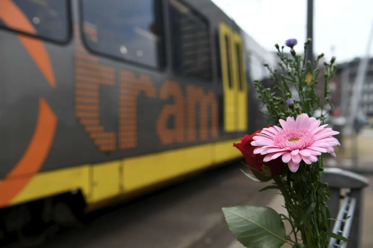 Flowers are placed at the site of a shooting in Utrecht, the Netherlands, on March 19, 2019. (Piroschka van de Wouw/Reuters)