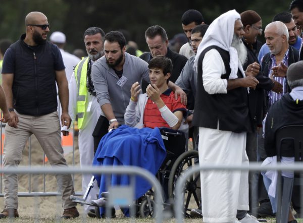 youth reacts at funeral of family