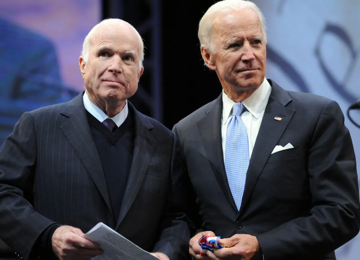 Sen. John McCain (R-Ariz.) receives the the 2017 Liberty Medal from former Vice President Joe Biden at the National Constitution Center in Philadelphia, Penn., on Oct. 16, 2017. (William Thomas Cain/Getty Images)