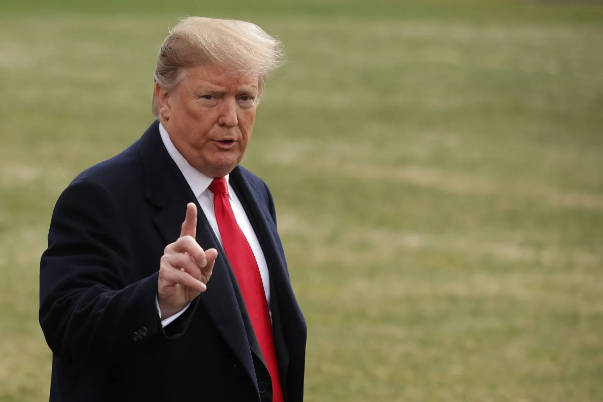President Donald Trump talks with journalists before departing the White House March 20, 2019 in Washington. (Chip Somodevilla/Getty Images)
