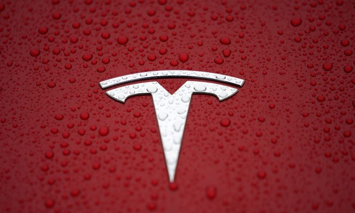 A Tesla logo is seen at a groundbreaking ceremony of Tesla Shanghai Gigafactory in Shanghai, China, on Jan. 7, 2019. (Aly Song/Reuters)