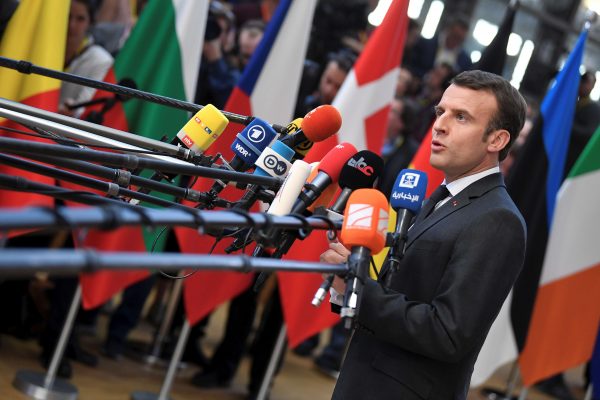 French President Emmanuel Macron talks to the media