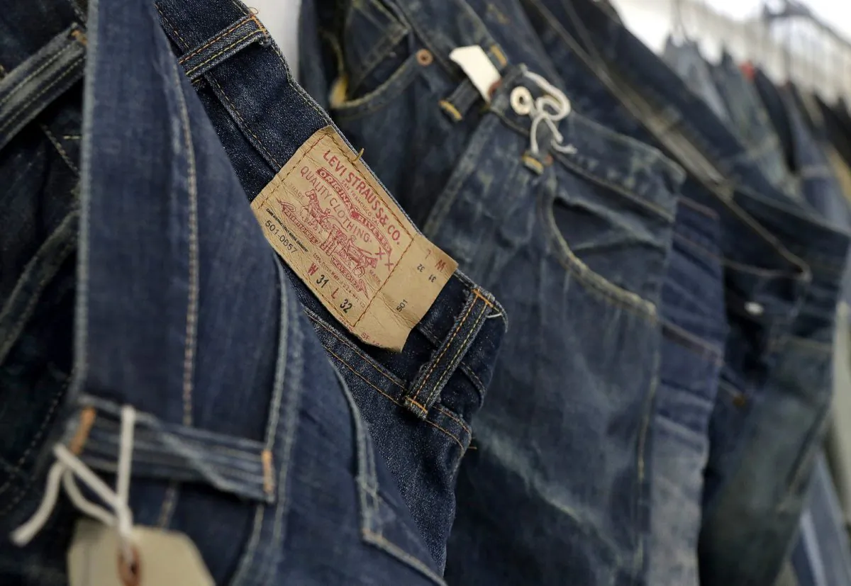 Levi's jeans hanging on a wall at Levi's innovation lab in San Francisco. On Mar. 21, 2019.  (Jeff Chiu, AP Photo/File)