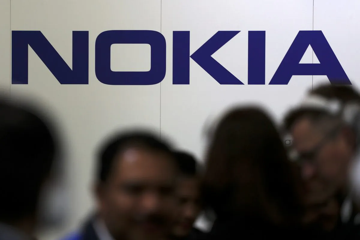 Visitors gather outside the Nokia booth at the Mobile World Congress in Barcelona, Spain on Feb. 26, 2019. (Sergio Perez/Reuters)