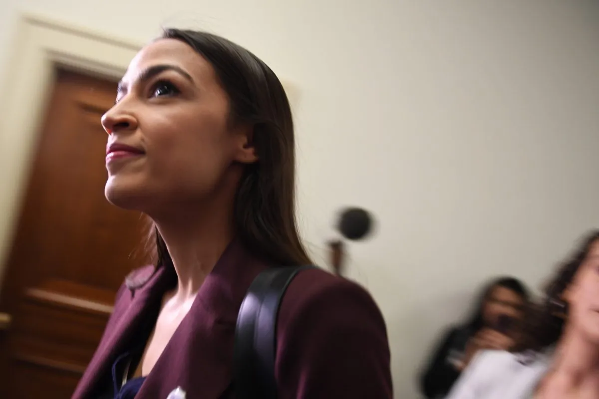 Congresswoman Alexandria Ocasio-Cortez (D-NY) arrives to hear Michael Cohen, attorney for President Trump, testify before the House Oversight and Reform Committee in the Rayburn House Office Building on Capitol Hill in Washington on February 27, 2019. (JIM WATSON/AFP/Getty Images)