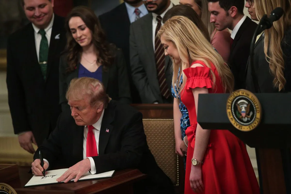 President Donald Trump signs an executive order during an East Room event at the White House March 21, 2019 in Washington. (Alex Wong/Getty Images)