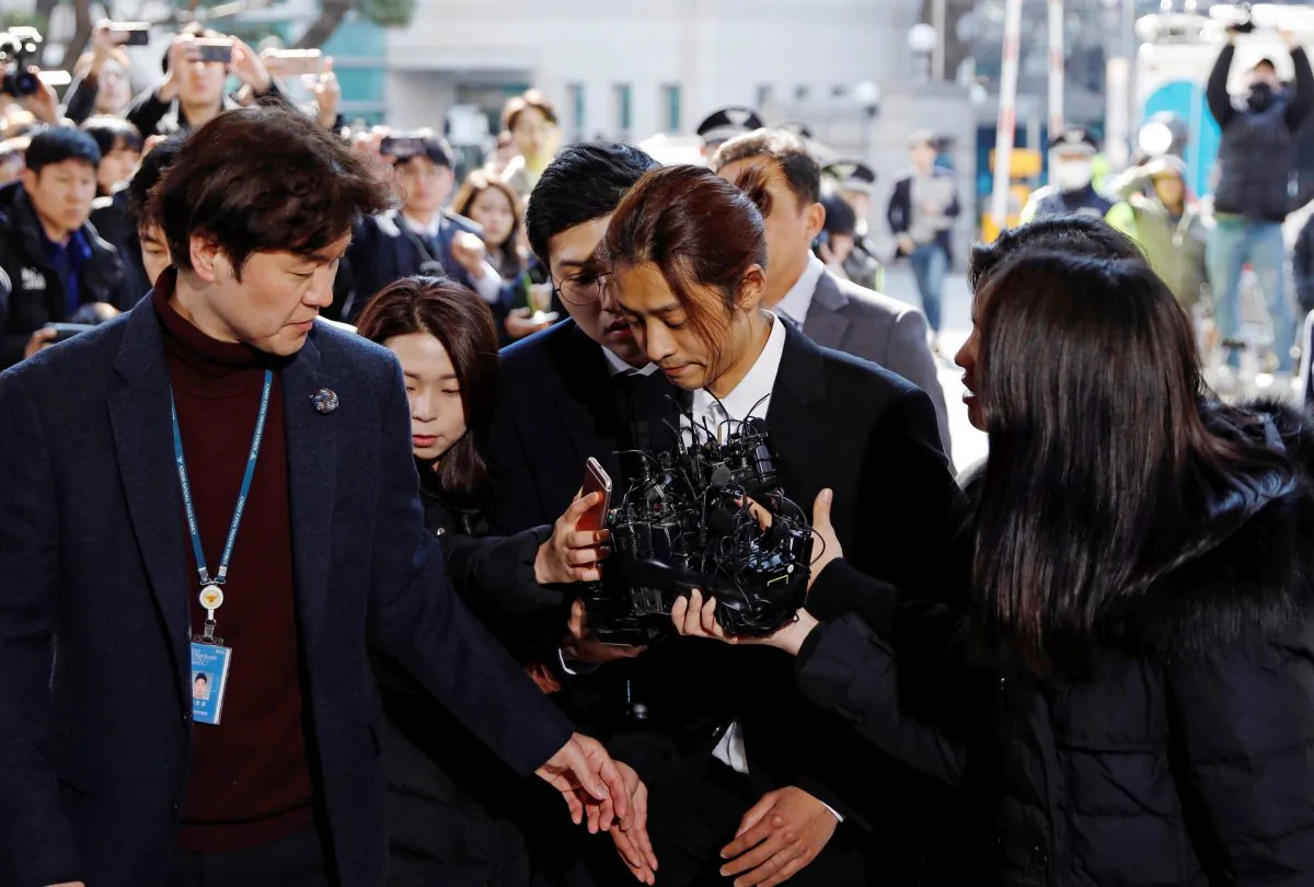 South Korean singer Jung Joon-young arrives for questioning on accusations of illicitly taping and sharing sex videos on social media, at the Seoul Metropolitan Police Agency in Seoul, South Korea, March 14, 2019. (Kim Hong-Ji/Reuters)