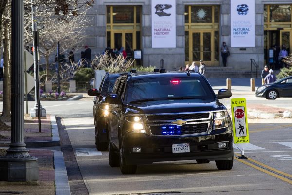 The motorcade for Attorney General William Barr arrives at the Department of Justice