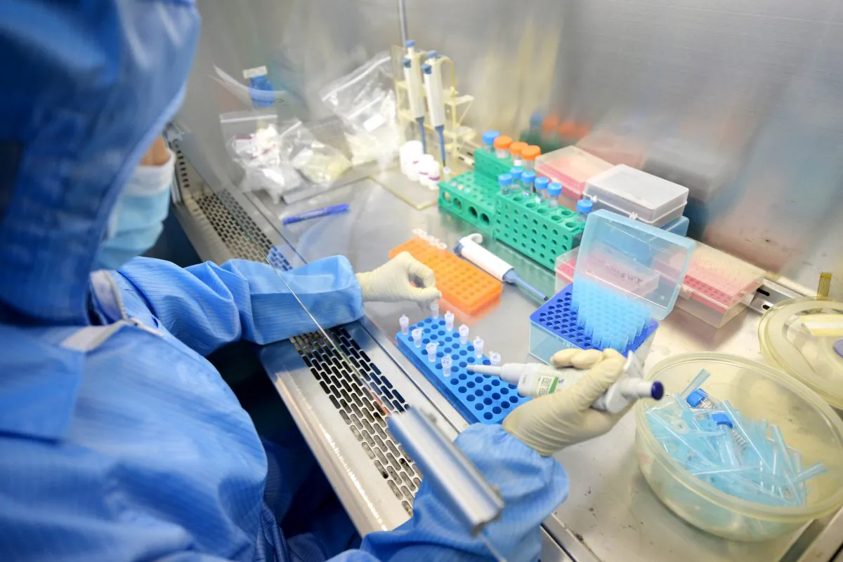 A worker in a laboratory at Shenzhen Puruikang Biotechnology Co., Ltd. on Aug. 26, 2014 in Shenzhen, Guangdong province of China. (VCG via Getty Images)