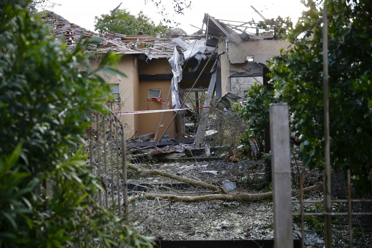 Damage to a house hit by a rocket, in Israel