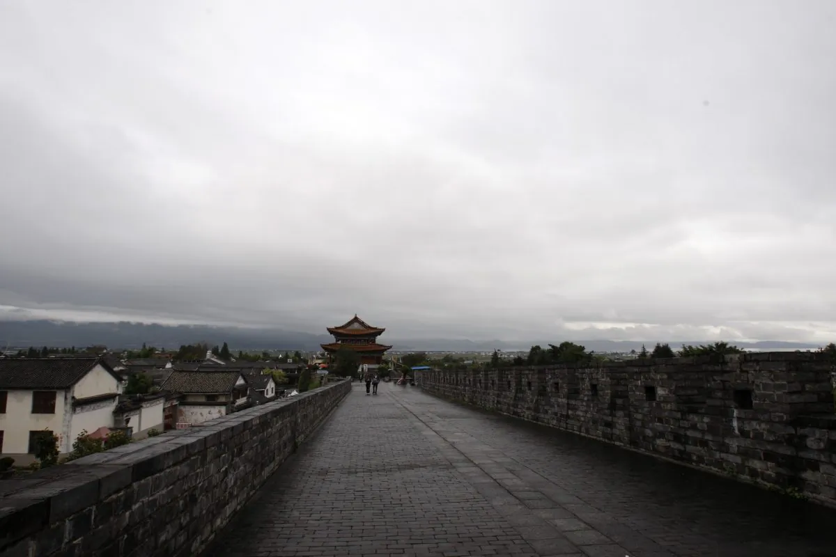 Tourists view the city wall at the old town of Dali, Yunnan Province, China, on Oct. 31, 2008. (China Photos/Getty Images)