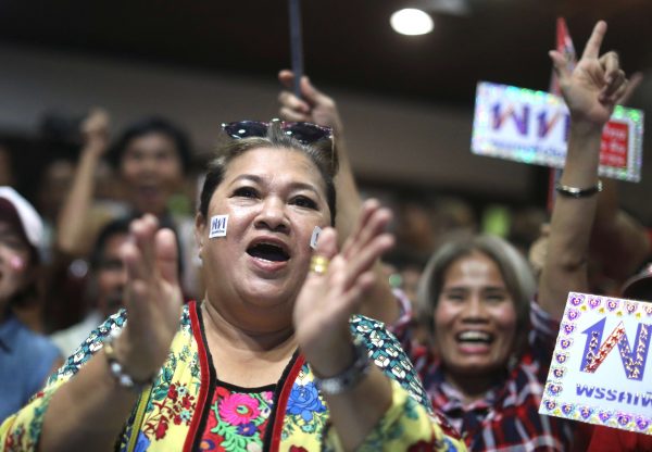 Supporters of Pheu Thai Party react