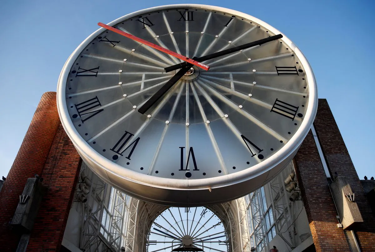 A giant clock at Cergy-Saint-Christophe railway station near Paris. More and more nations are abolishing Daylight Saving Time, for good reasons. (REUTERS/Christian Hartmann)