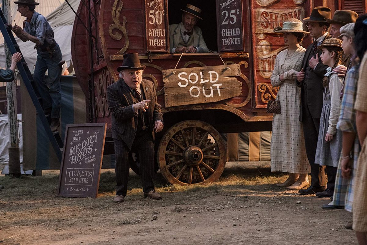 Short man in hat selling circus tickets