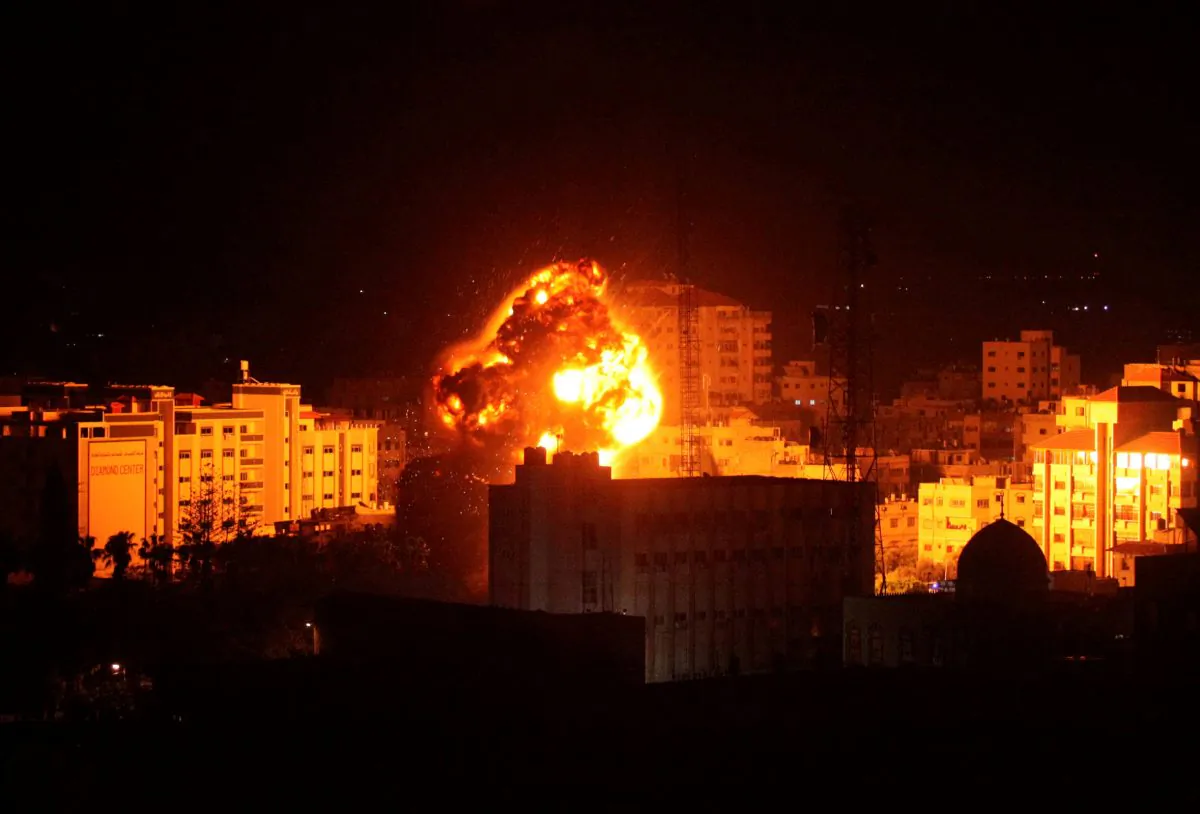 Flame and smoke are seen during an Israeli air strike in Gaza City March 25, 2019. (Mohammed Ajour/Reuters)