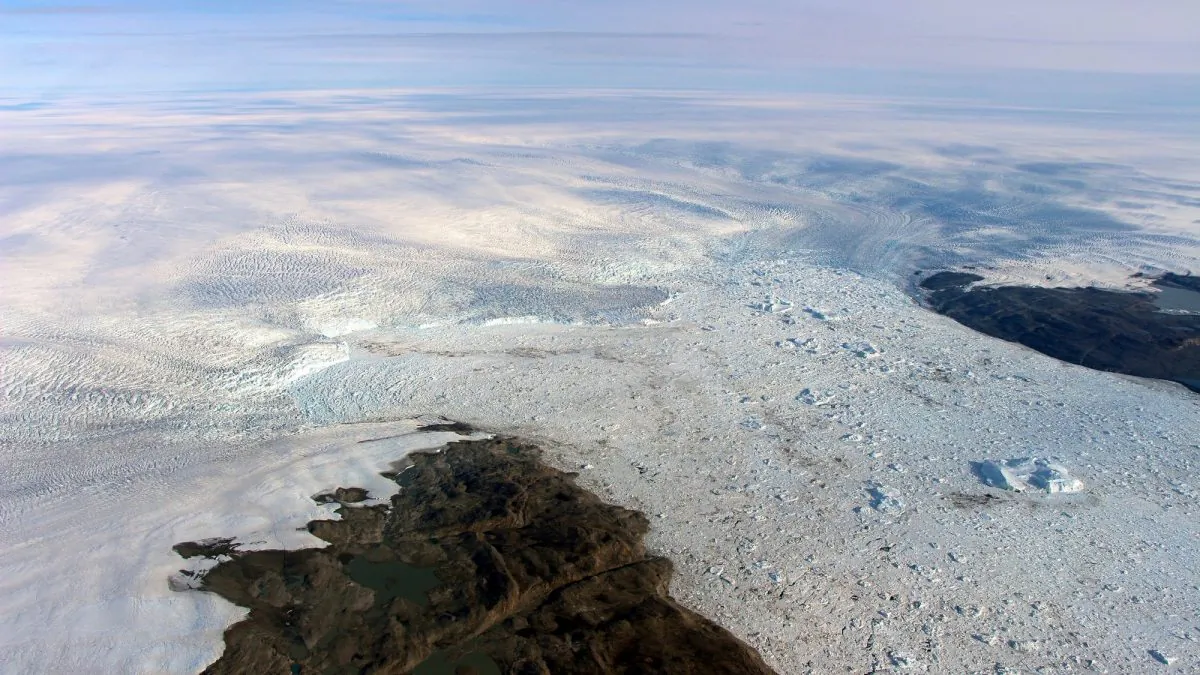 Patches of bare land at the Jakobshavn glacier in Greenland, in 2016. (NASA via AP)